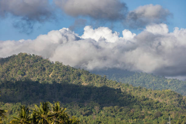 Mountain landscape with clouds.\nPalawan Island, Philippines.