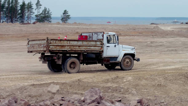 istock Truck moving on construction site outdoors 2203307204