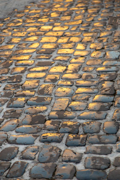 istock golden charmonic obble stone background 2203318629