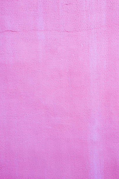Background for design with copy space. Old damaged dark pink plaster.