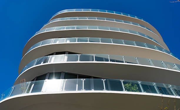 istock Modern skyscraper building. Architectural building in Miami beach. Skyscraper perspective view. Hotel architecture. Architecture of modern building. Perspective residential skyscraper. Low angle 2203330712