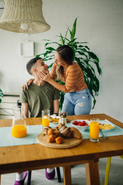 istock Lesbian couple sharing intimate moments during breakfast at home 2203331719