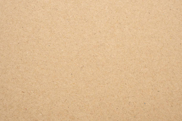 istock Old brown recycle cardboard kraft paper texture background 2203333306