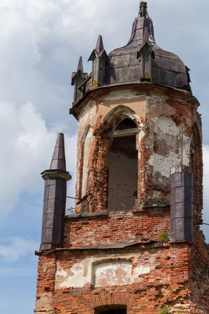 istock A weathered brick bell tower with gothic architectural details 2203334910