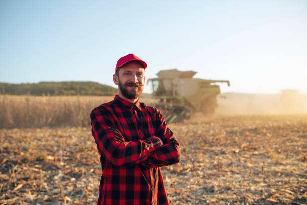istock Portrait of farmer during corn harvesting. 2203335279
