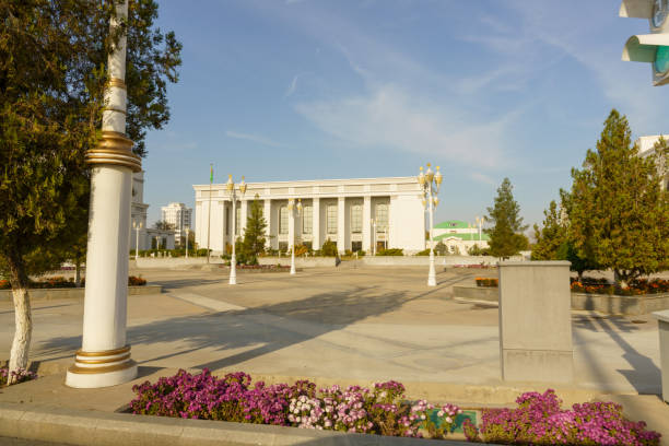 istock A large white building with a gold column in front of it 2203343124