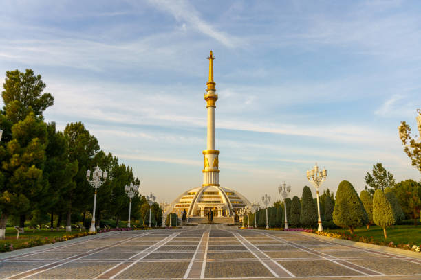 A large white building with a tall tower in the middle in Ashgabat, Ashgabat, Turkmenistan