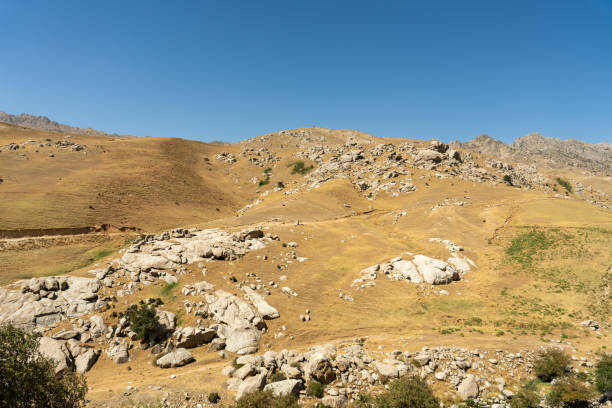 istock A rocky hillside with a clear blue sky 2203343799