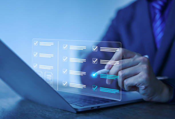 istock Online survey for business people using laptops, business performance survey concept, DMS document management system, performance appraisal. 2203345767