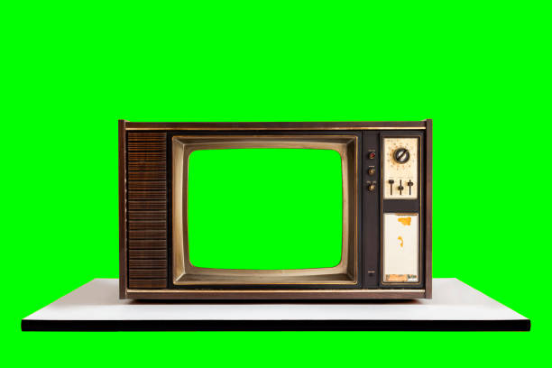 istock Vintage old television on white table with clipping path for a designer isolated with green screen and background. 2203348720