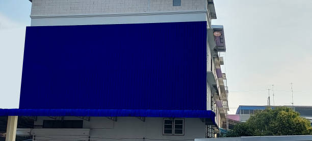 istock blue corrugated metal sheet install outside the buiding , copyspace 2203351628