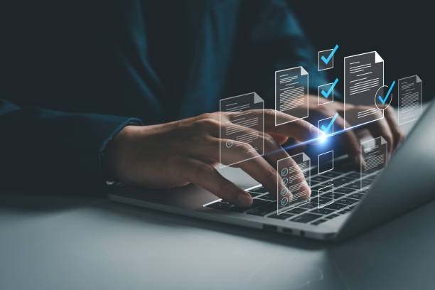 istock Manager is verifying the validity, security, approving requests, quality assurance, investment contracts. Online digital document work, paperless office. online survey. Checking mark up on check boxes 2203352130