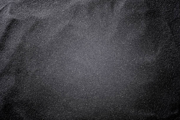 istock Abstract background of black sand 2203352676