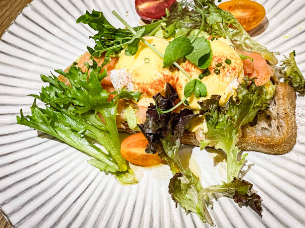 istock Perfectly Poached Eggs Benedict with Hollandaise Sauce 2203354046