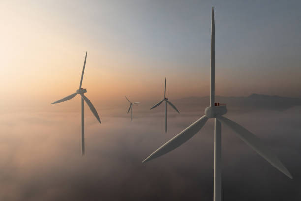 istock Wind Turbines Above Clouds with Sunrise Light 2203362296