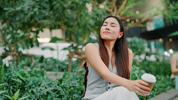 istock Businesswoman taking a break after working 2203363330