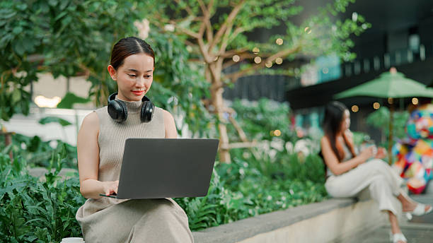 istock Asian businesswoman using laptop 2203363400
