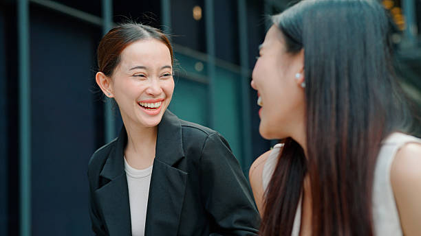 istock Two businesswoman walking and talking after work 2203363565