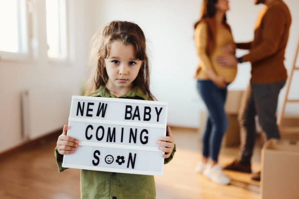 istock I am not happy for new baby arrival! 2203365618