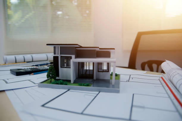 istock Architects, engineers, contractors working in the office with blueprints, inspection engineers Work analysis for architectural plan, construction project sketch, focus, business construction concept. 2203366452
