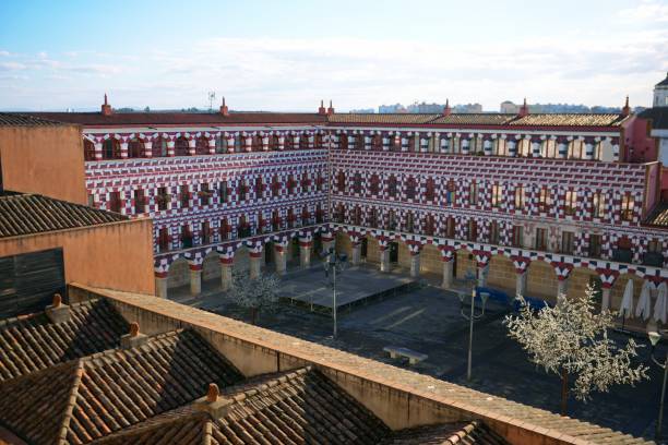 istock Historic Plaza Alta square in Badajoz with red and white patterned facades 2203376132