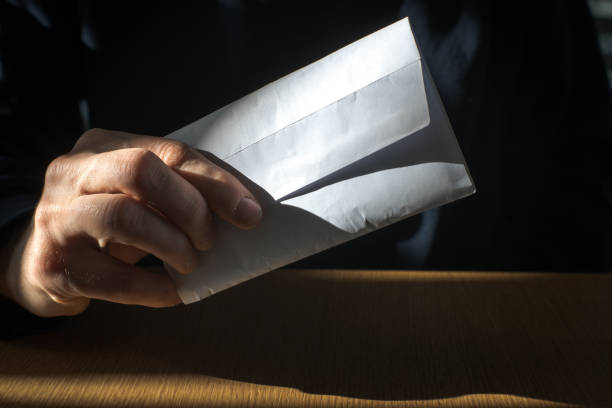 Dishonest financial gain, money in an envelope, bribe.
