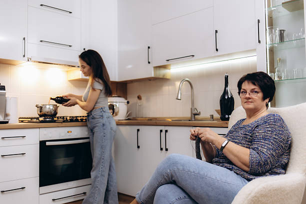 istock Mother and Daughter Spending Time Together in a Cozy Modern Kitchen 2203380768