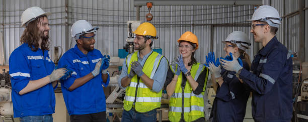 istock Workers Factory or Engineering work at factory site check up machine or products in site. Foreman or Technician checking Material or Machine on Plant. Heavy industry factory concept. 2203381905