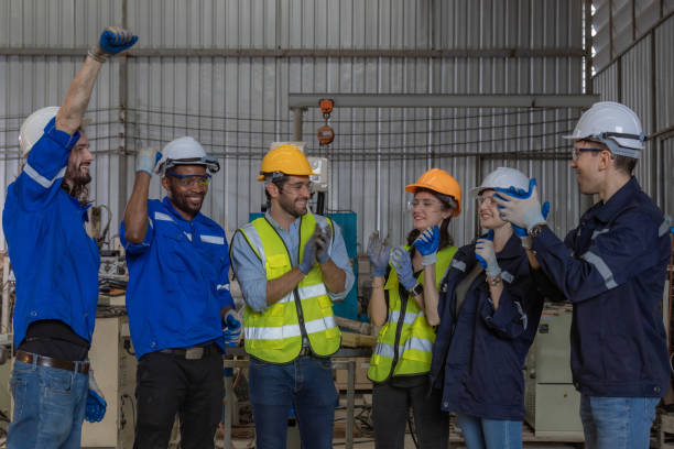 istock Workers Factory or Engineering work at factory site check up machine or products in site. Foreman or Technician checking Material or Machine on Plant. Heavy industry factory concept. 2203381907