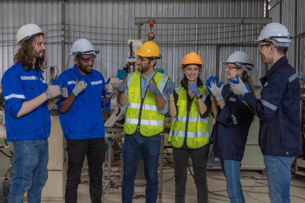 istock Workers Factory or Engineering work at factory site check up machine or products in site. Foreman or Technician checking Material or Machine on Plant. Heavy industry factory concept. 2203381922