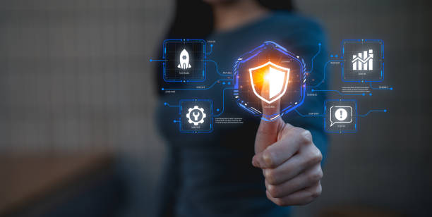 istock A person interacts with digital security icons, symbolizing protection and technological advancements in cybersecurity. 2203383851