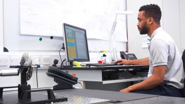 istock Male Engineer Uses CMM Coordinate Measuring Machine In Factory 2203384513