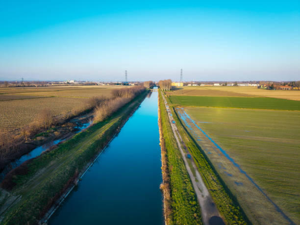 istock Irrigation canal in Piedmont countryside. Drone view 2203384825