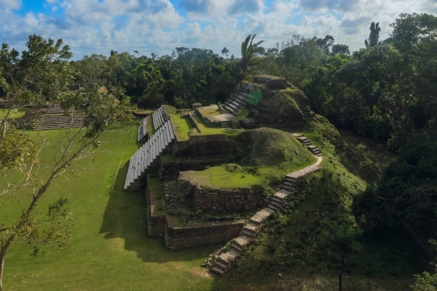 Exploring Altun Ha ruins in Belize shows ancient Mayan architecture and lush greenery