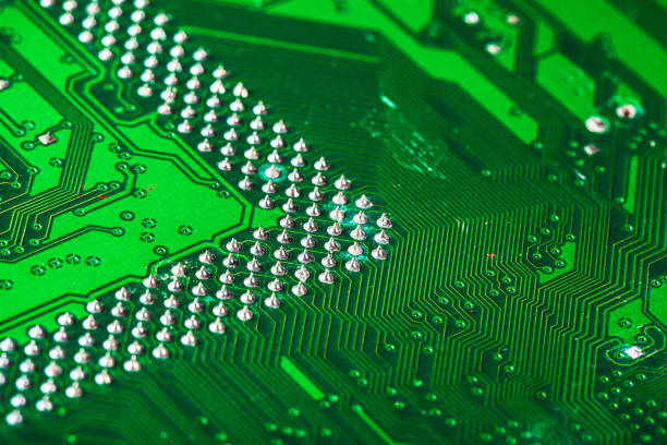 istock Green circuit board of a computer close up 2203387516