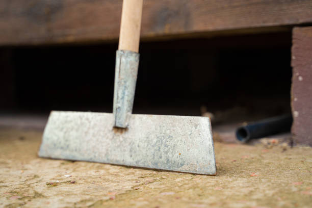 istock Ice pick for breaking ice on paths, close-up. Tool for clearing ice from the path 2203392508
