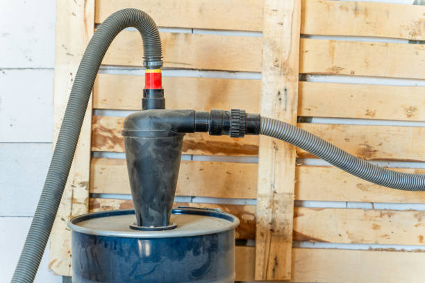 istock Cyclone dust collection system connected to a vacuum cleaner. System for extracting sawdust when working with wood 2203392573