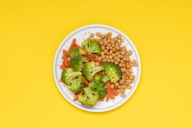 istock Healthy salad with broccoli, carrots and chickpeas 2203394336