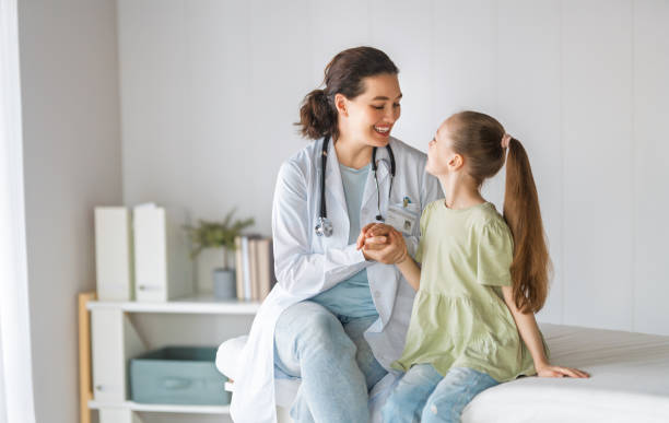 istock patient with a doctor in medical office 2203395312