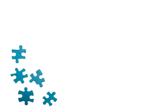 Frame formed of blue puzzle pieces. Photo of jigsaw puzzle pieces isolated against white background. Business, logic, conceptual background