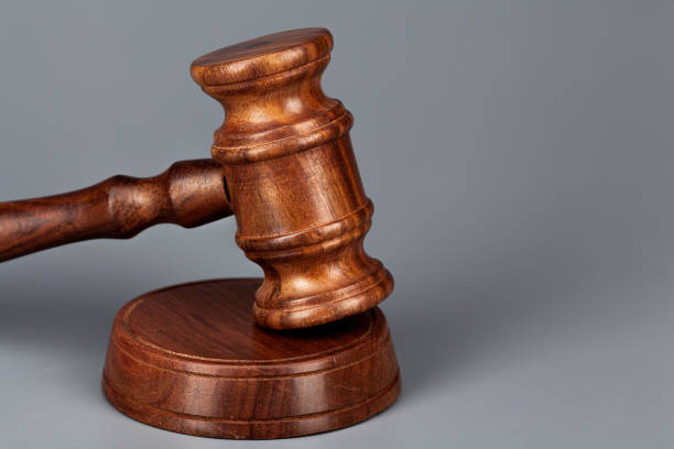 istock Wooden judges gavel on table close up 2203397840