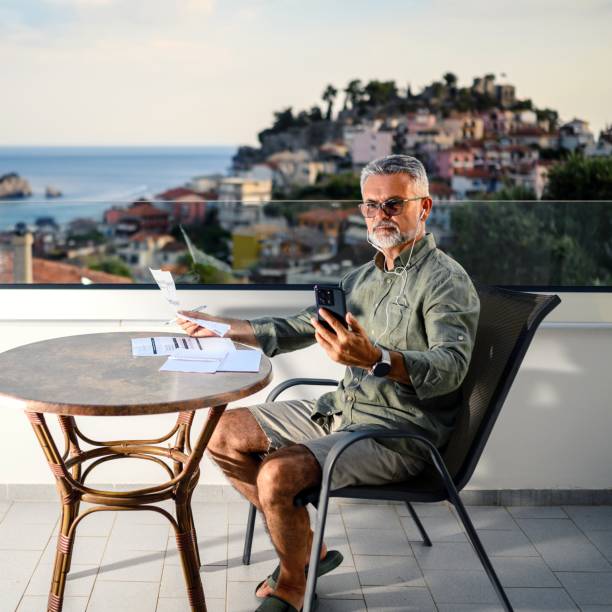 istock Businessman who has a business meeting over a smartphone 2203398607
