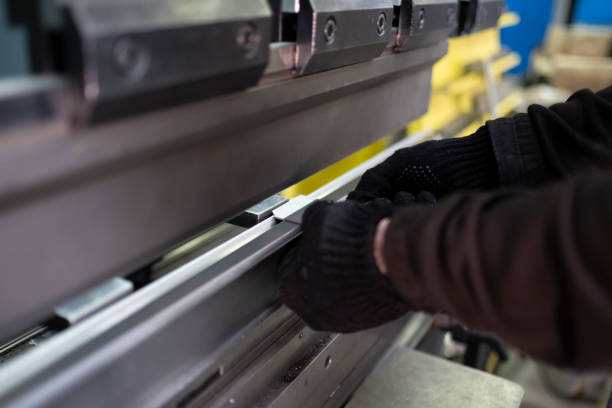 istock operator bending metal sheet by sheet bending machine bending of metal 2203400237