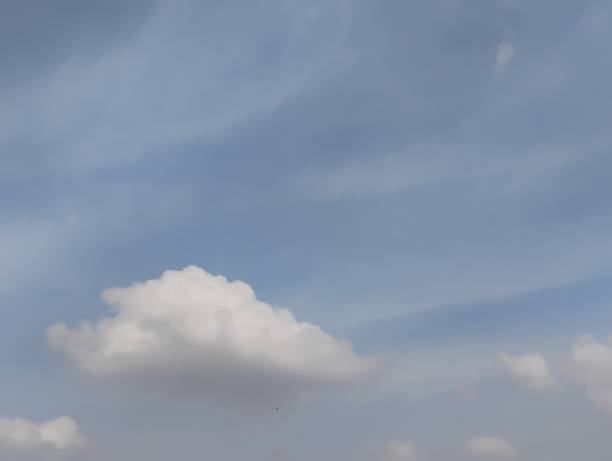 istock Beautiful heavenly cumulus clouds happily float in the sky 2203402844