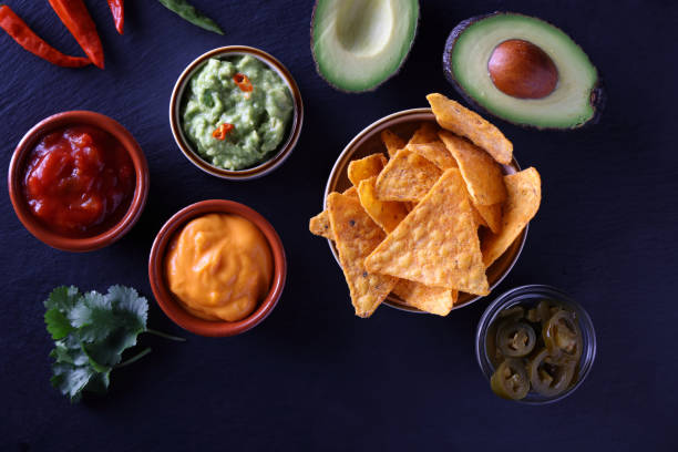Party appetizer snack including Nachos and Guacamole