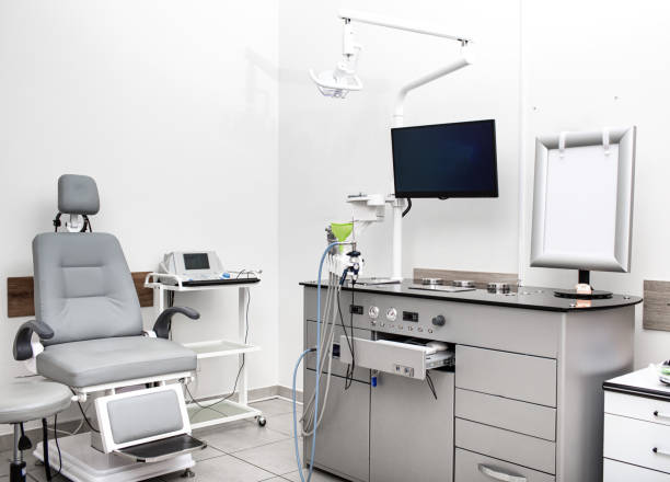 istock Modern audiology clinic features an equipped assessment area with hearing devices, a patient chair, and diagnostic tools ready for testing 2203408173