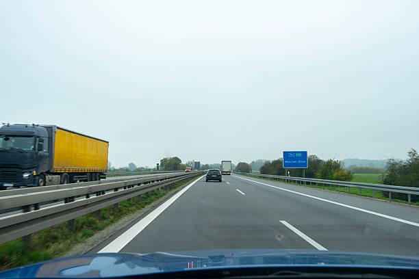 Car Driving On The Road , Farmland