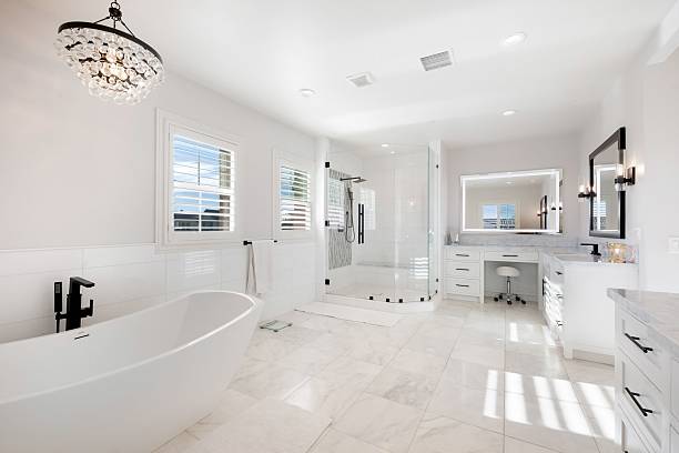 istock Bright and elegant bathroom with large windows in a luxury home 2203418048