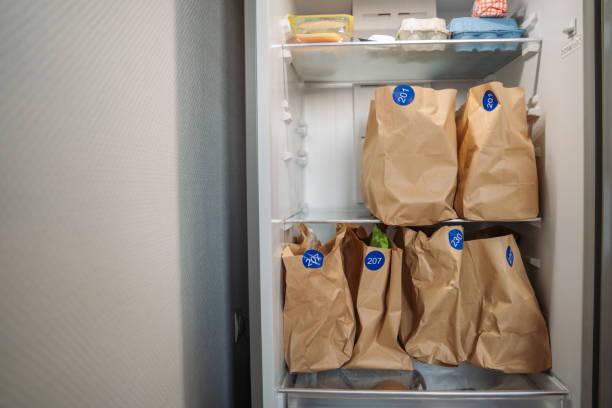 istock Groceries in brown paper bags 2203419011