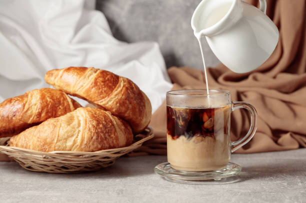 istock Croissants and coffee with cream. 2203420399